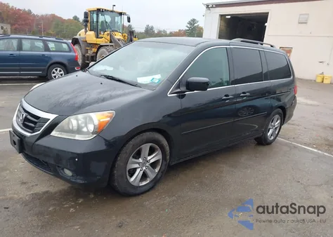 2008 Honda Odyssey Touring z USA, uszkodzony, nr VIN 5FNRL38948B093282